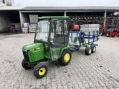 John Deere 332 mit Rückewagen &amp; Schneeschild