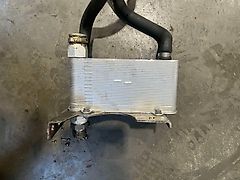 John Deere OIL COOLER FOR AUTO POWER (AP) TRANSMITION (used) - John Deere 6030, 7030