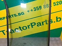 John Deere LOWER FRONT GLASS LEFT - CURVED - TINTED (used) - John Deere 6000, 6010