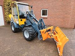 Eurotrac w 12 Winterdienst inkl. Streuer und Schneeschild